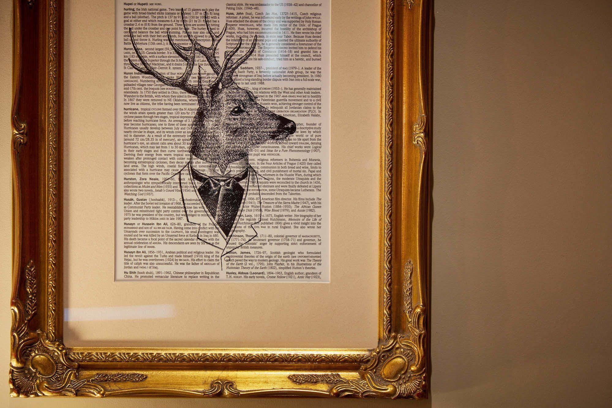 Oddfellows On The Park Cheadle  Exterior foto A framed print of a deer head with a bow tie
